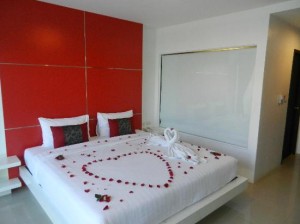 al.fres.co Phuket Hotel bedroom with bathroom open glass room