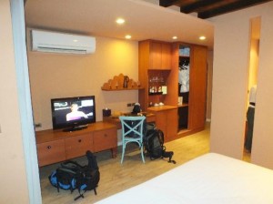 Amber Boutique Silom opposite of bed view of the room and amenities