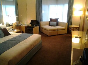 Holiday Inn Bangkok Silom bedroom with sofa