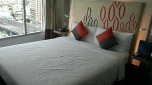 Novotel Bangkok Silom Road bedroom with view outside