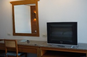 Royal Twins Palace Hotel room TV and desk