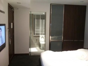 S33 Compact Sukhumvit Hotel TV and toilet view