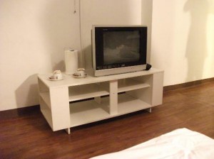 Take a Nap Hotel view of the TV from the bed