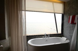 The Now Hotel tub with beach view