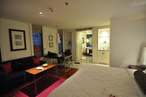 Triple Two Silom Boutique Hotel bed corner and view of the big room