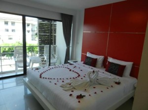 al.fres.co Phuket Hotel bedroom with balcony view